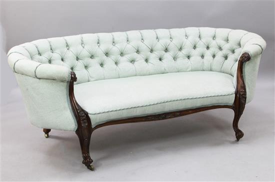 A Victorian rosewood tub shaped settee, L.6ft D.2ft 8in. H.2ft 5in.